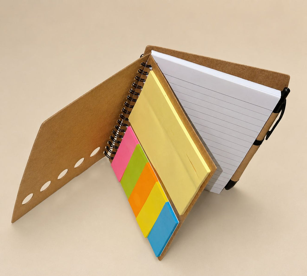 Compact notebook with sticky notes and pen
