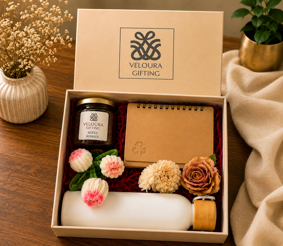 Veloura Gifting thank you box with mixed berries jar, eco notebook, and dried flowers